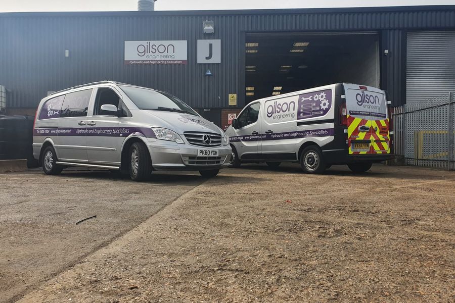 Gilson Engineering vans outside office